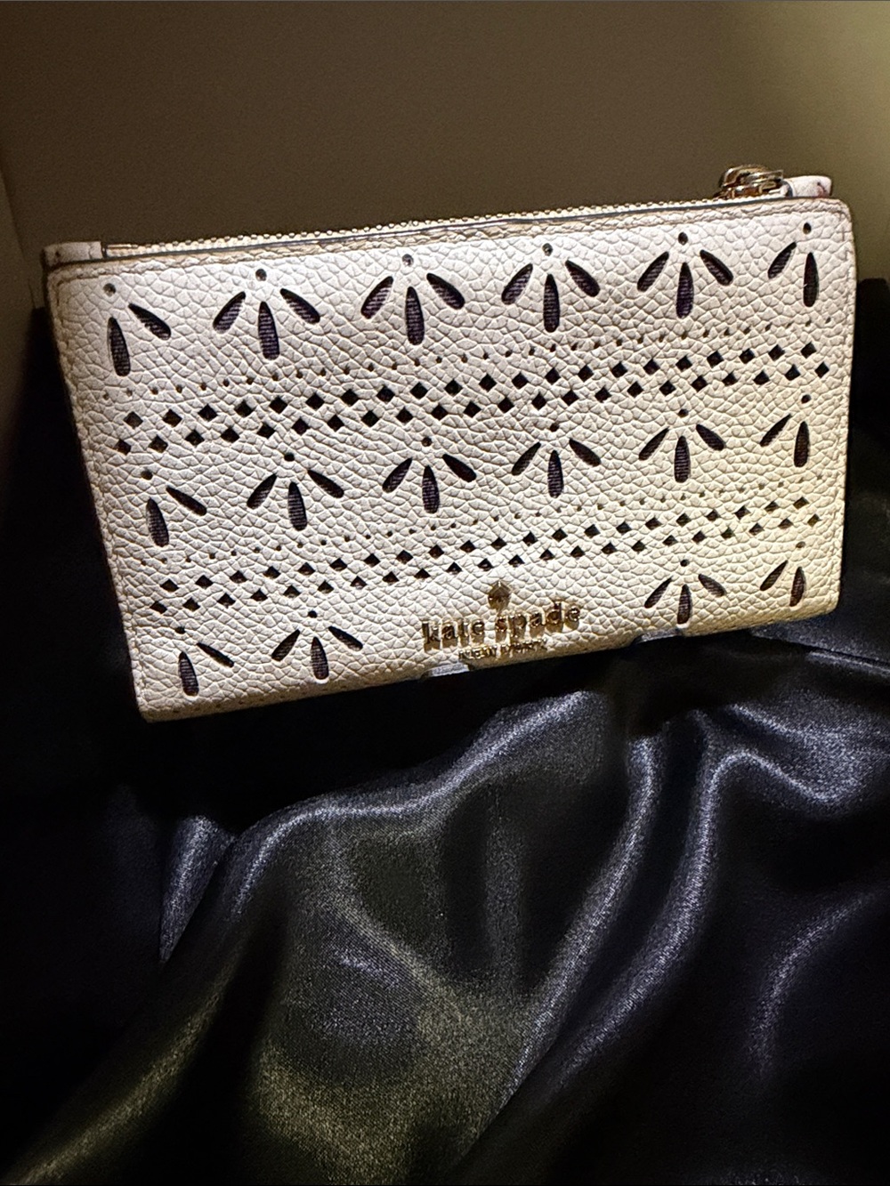 EUC Kate Spade White Perforated Leather Zip Wristlet with Gold Logo